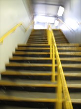 Low Angle View of Blurred Steps in Train Station