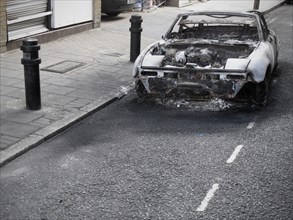 Burnt out Car on Road