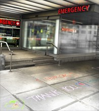 Heroes Thank You Message written on Sidewalk in front of Emergency Entrance to Urgent Care Facility