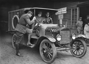 American Red Cross Doctor with her Assistants in American Red Cross Ambulance from Gare de l'Est