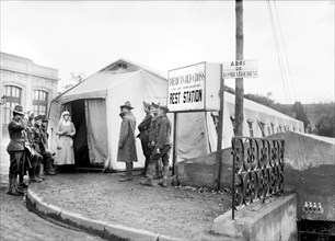 American Red Cross Worker with Soldiers at ARC Rest Station next to Bomb Shelter