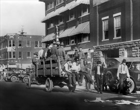 Truck on Street near Litan Hotel carrying Soldiers and African Americans during Race Riots
