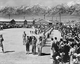 Evacuees of Japanese Ancestry attending Memorial Day services at War Relocation Authority Center