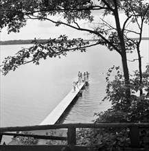 Group of Girls on Swimming Dock