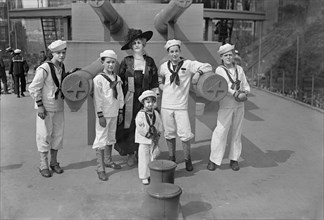 Grace Carley Harriman (1873-1950) with Junior Naval and Marine Scouts on the U.S.S. Recruit