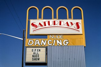Saturdays Nude Dancing sign