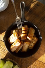 High Angle View of Apple Pastries in Cast Iron Skillet