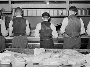 Workers sorting mail at Main Post Office, Washington, 1938