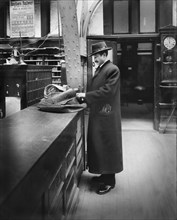Man at Post Office, Washington, February 1907