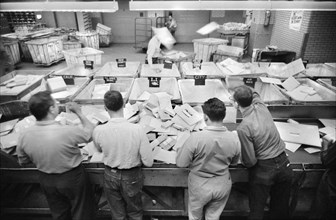 Workers sorting mail at Post Office, New York City, May 1957