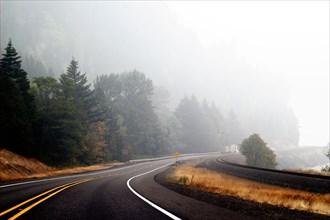 Curving Highway, Wildfire Smoke obstructing View into Distance,