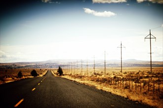 Empty Two-Lane Highway in Rural Landscape,,
