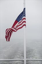 American Flag waving on Rear of Ferry,,