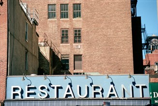 Blue & White Restaurant Sign on Building,,