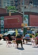 People sitting in Chairs, Street Scene, USA