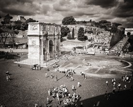 Tourists at Arch of Constantine, Rome,