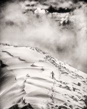 Hiker on Snow Mountain Ridge,,