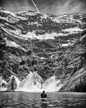 Rear View of Man Kayaking, White Boar Lake,