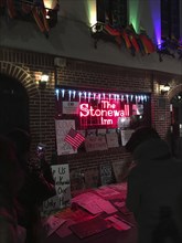 Protest Signs in front of Stonewall Inn at Night, Greenwich Village,