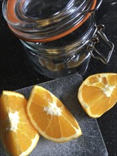 High Angle View of Orange Slices with Glass Jar,,