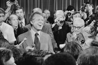 U.S. President Jimmy Carter at Press Conference, surrounded by Journalists
