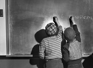 Two Children studying in Hebrew School, Colchester