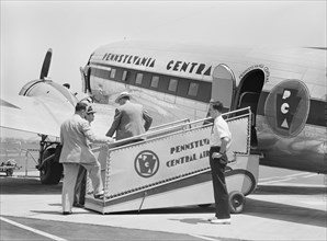 Passengers boarding Airplane, Municipal Airport