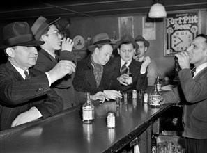 Men and Bartender drinking in Catholic Sokol Club, Ambridge