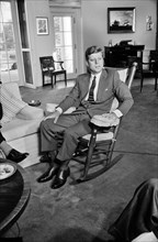 U.S. President John Kennedy, seated portrait in Rocking Chair