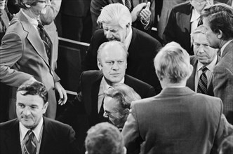 U.S. President Gerald Ford surrounded by members of the 94th Congress, including Majority Leader Tip O'Neill