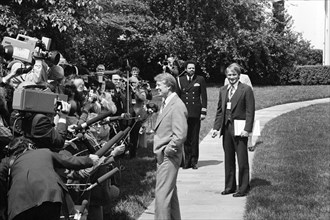 U.S. President Jimmy Carter speaks to media after departure of Jordan's King Hussein from White House, Washington