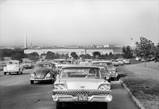 Rush Hour Traffic with Washington Memorial, Pentagon and Capitol Building in Background