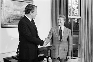 Australian Prime Minister Malcolm Fraser shaking hands with U.S. President Jimmy Carter, Half-Length Portrait