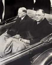 U.S. President Herbert Hoover and U.S. President-Elect Franklin Roosevelt in Convertible Automobile on way to U.S. Capitol for Roosevelt's Inauguration