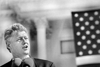U.S. President Bill Clinton speaking into Microphone at U.S. Capitol during Ceremony for return of Statue of Freedom to the top of U.S. Capitol