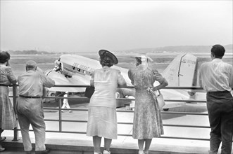 Visitors watching Airplane from Observation Platform