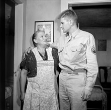 Sergeant George Camblair and his mother while at Home on Weekend Furlough