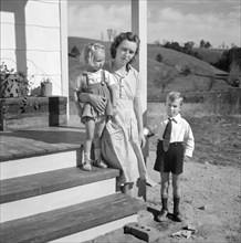 Mr. Howard H. Smith with her children Elsie Marie and Howard Jr.