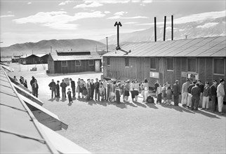 Japanese-Americans waiting in line at Mess Hall