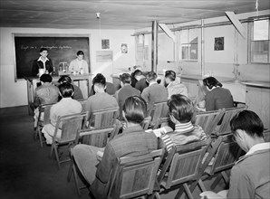 Japanese-American Students sitting in Classroom Laboratory during Science Lecture