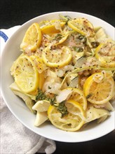 Marinated Artichokes with Lemon Slices and Herbs