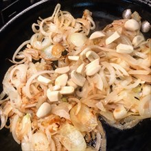Sauteed Onions and Garlic in Frying Pan