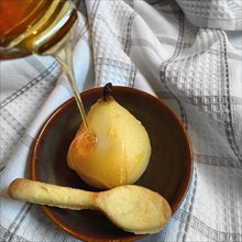 Poached Pear Drizzled with Honey with Shortbread Cookie Spoon