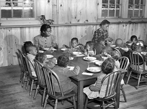 children, African-American ethnicity, food and drink, migratory labor camp, historical,