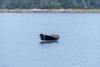 Wooden Rowboat on Mooring