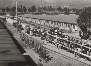 Japanese Americans waiting in lines