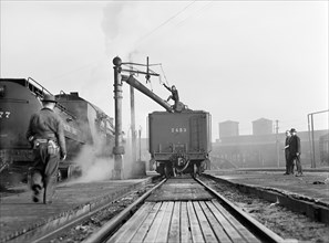 Female Railroad Worker working on Maintenance of Freight and Passenger Trains