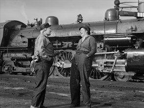 Two Female Railroad Workers enjoying a break from their jobs