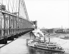 Riverboat and Suspension Bridge