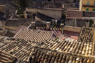 High Angle View of Tiled Rooftops